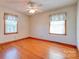 Spacious bedroom featuring hardwood floors and two windows at 113 Debby Dr, Shelby, NC 28152