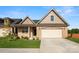 Craftsman style home with a two-car garage and landscaped lawn at 829 C Wynnshire Dr # 57, Hickory, NC 28601