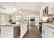 Modern kitchen with stainless steel appliances and large island at 829 C Wynnshire Dr # 57, Hickory, NC 28601