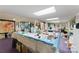 Art studio with large work table and various art supplies at 1346 Hill Rd, Charlotte, NC 28210
