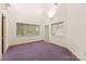 Spacious office with large windows and purple carpet at 1346 Hill Rd, Charlotte, NC 28210