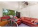 Relaxing living area with red couch, red bench, and bicycle at 1346 Hill Rd, Charlotte, NC 28210