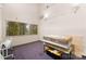 Studio room with large window, purple carpet, and art supplies at 1346 Hill Rd, Charlotte, NC 28210