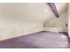 Bright studio room featuring purple carpet and a loft-like feel at 1346 Hill Rd, Charlotte, NC 28210