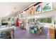 Large art studio with multiple work tables and abundant natural light at 1346 Hill Rd, Charlotte, NC 28210