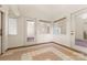 Sunroom featuring tile floors and multiple windows at 1346 Hill Rd, Charlotte, NC 28210