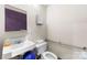 Clean bathroom featuring a toilet and sink at 1346 Hill Rd, Charlotte, NC 28210