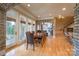 Bright dining room with hardwood floors and access to both kitchen and living areas at 277 Tradition Dr, Mount Gilead, NC 27306