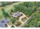 House and lot aerial view, showcasing its location within a golf course community at 277 Tradition Dr, Mount Gilead, NC 27306