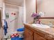 Bathroom with shower stall, vanity, and floral decor at 1071 Hawks Nest Rd, York, SC 29745