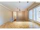 Bright dining area with hardwood floors and a view to the hallway at 227 Dotger Ave # E-14, Charlotte, NC 28207