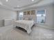 Bright bedroom with carpeted floor, large window, and ample space at 1816 Teachers House Nw Rd, Concord, NC 28027
