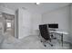 Bright home office with desk and chair near hallway at 1816 Teachers House Nw Rd, Concord, NC 28027