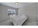 Comfortable bedroom with a queen-size bed and a large window at 1816 Teachers House Nw Rd, Concord, NC 28027