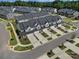 Aerial view of townhouses with spacious driveways and landscaping at 1816 Teachers House Nw Rd, Concord, NC 28027