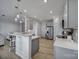 Open concept kitchen with island and stainless steel appliances at 1816 Teachers House Nw Rd, Concord, NC 28027