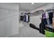 Walk-in closet with ample shelving and hanging space for clothes at 1816 Teachers House Nw Rd, Concord, NC 28027