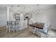 Kitchen dining area with wood table and seating for four at 1816 Teachers House Nw Rd, Concord, NC 28027