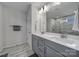 Elegant bathroom with double vanity, gray cabinets, and a large mirror at 1816 Teachers House Nw Rd, Concord, NC 28027