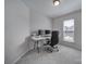 Home office with a desk, chair, and two monitors at 1816 Teachers House Nw Rd, Concord, NC 28027