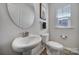 Simple, clean bathroom with pedestal sink and toilet at 1816 Teachers House Nw Rd, Concord, NC 28027