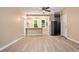 Open living room and kitchen area with vinyl flooring at 1116 N Lafayette St, Shelby, NC 28150