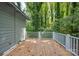 Spacious deck overlooking a wooded area, perfect for outdoor relaxation at 1116 N Lafayette St, Shelby, NC 28150