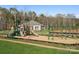Community playground with swings and play structure for children at 2243 Carpenter Farms Dr, Lincolnton, NC 28092