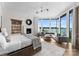 Spacious main bedroom with a sitting area and lake views at 19125 Peninsula Point Dr, Cornelius, NC 28031