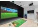 High-tech golf simulator with large projection screen at 19125 Peninsula Point Dr, Cornelius, NC 28031