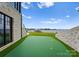 Private putting green with lake views at 19125 Peninsula Point Dr, Cornelius, NC 28031