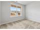 Spacious bedroom with grey carpet and a large window overlooking neighborhood at 2243 Carpenter Farms Dr, Lincolnton, NC 28092
