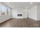 Bright living room with hardwood floors and a fireplace at 2243 Carpenter Farms Dr, Lincolnton, NC 28092