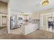 Modern kitchen with island and stainless steel refrigerator at 3317 Green Meadow Dr, Charlotte, NC 28269