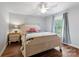 Charming bedroom features a queen-size bed, nightstand, and hardwood floors at 534 Coman Ln, Kings Mountain, NC 28086