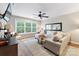 Spacious bonus room with large windows, comfortable seating, and a ceiling fan at 534 Coman Ln, Kings Mountain, NC 28086