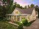 Two story home with large front porch at dusk at 534 Coman Ln, Kings Mountain, NC 28086