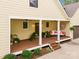 Inviting front porch with comfortable seating and lush landscaping at 534 Coman Ln, Kings Mountain, NC 28086
