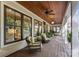 Relaxing covered porch with ceiling fan and seating at 534 Coman Ln, Kings Mountain, NC 28086