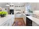 White kitchen with corner sink, gas cooktop, and ample counter space at 534 Coman Ln, Kings Mountain, NC 28086