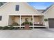 Relaxing front porch features a built-in bench and charming decor at 534 Coman Ln, Kings Mountain, NC 28086