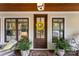 Inviting front door entrance with a yellow floral wreath at 534 Coman Ln, Kings Mountain, NC 28086