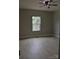 Spacious bedroom with light-colored flooring and a ceiling fan at 3656 Raymond Loop, Newton, NC 28658