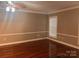 Spacious living room featuring hardwood floors and neutral walls at 300 N Fulton St # 11, Salisbury, NC 28144