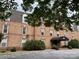Brick building exterior with landscaping and parking at 300 N Fulton St # 11, Salisbury, NC 28144