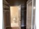 Small toilet room with patterned wallpaper at 300 N Fulton St # 11, Salisbury, NC 28144