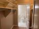 Clean bathroom with bird wallpaper and tiled flooring at 300 N Fulton St # 11, Salisbury, NC 28144