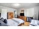 Well-lit bedroom featuring a double bed, dresser, and a flat-screen TV at 115 Abernathy St, Mount Holly, NC 28120