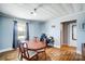Dining room with hardwood floors and a wood dining table at 115 Abernathy St, Mount Holly, NC 28120