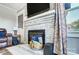 Cozy living room fireplace with a decorative mantel at 115 Abernathy St, Mount Holly, NC 28120